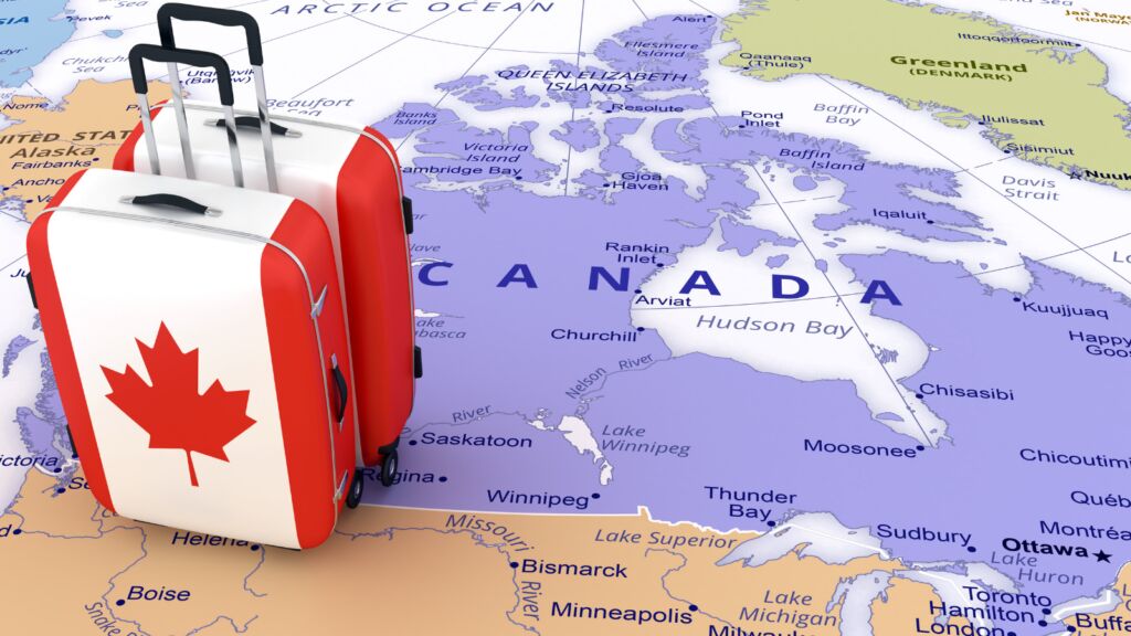 خريطة كندا مع حقيبة سفر تحمل العلم الكندي - التدريب المهني في كندا 